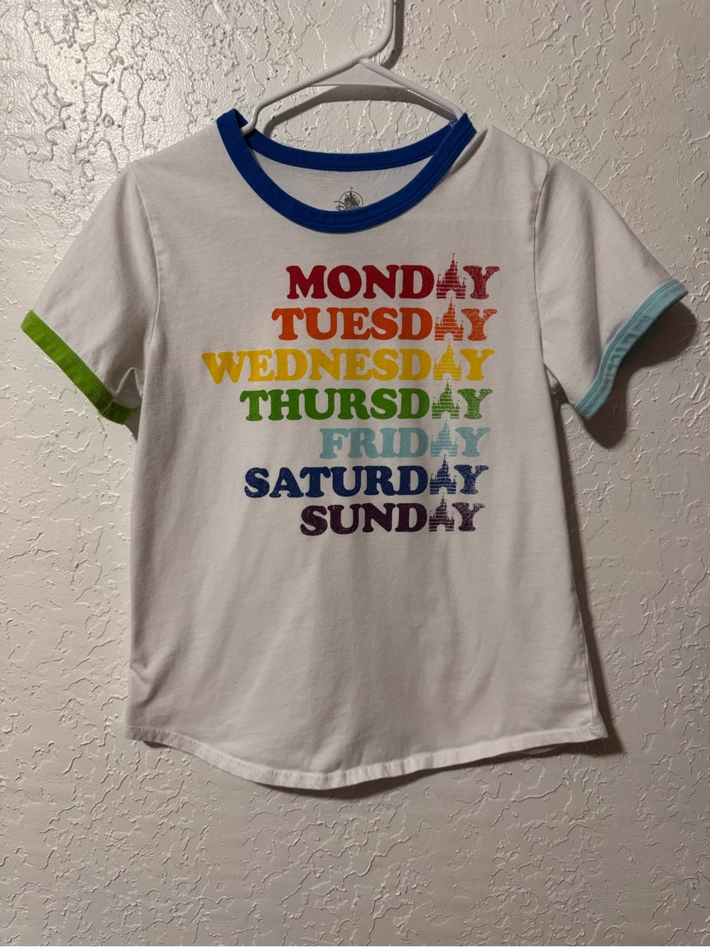 Disney Parks Rainbow Colors Days of the Week Castle Ringer Tee